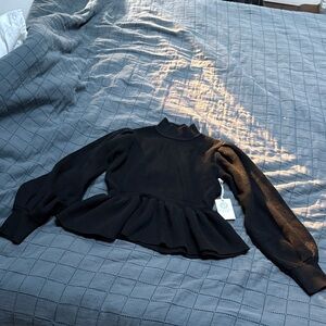 Elegant Black Peplum Sweater